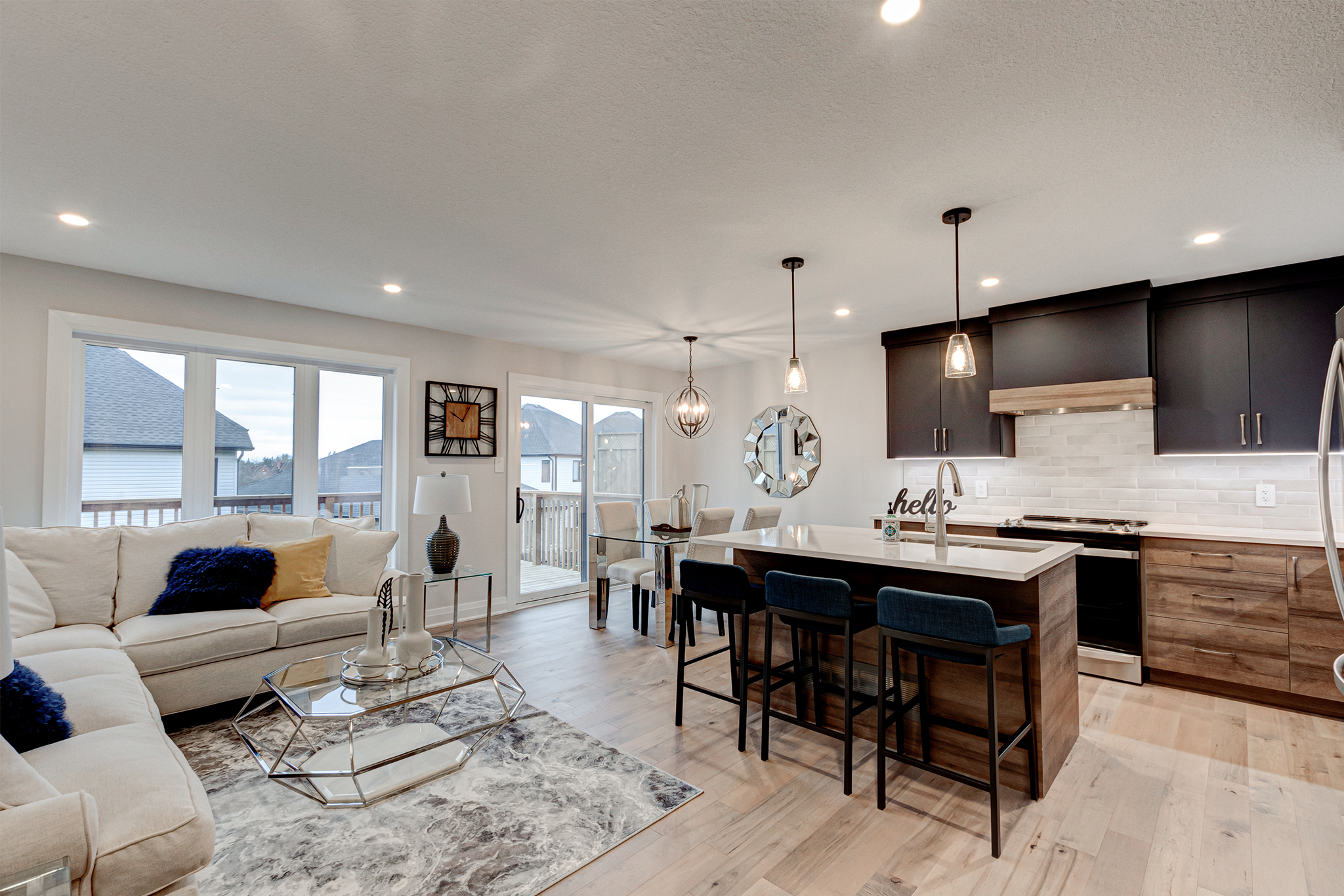 Kitchen, living and dining area in a Rembrandt model home.