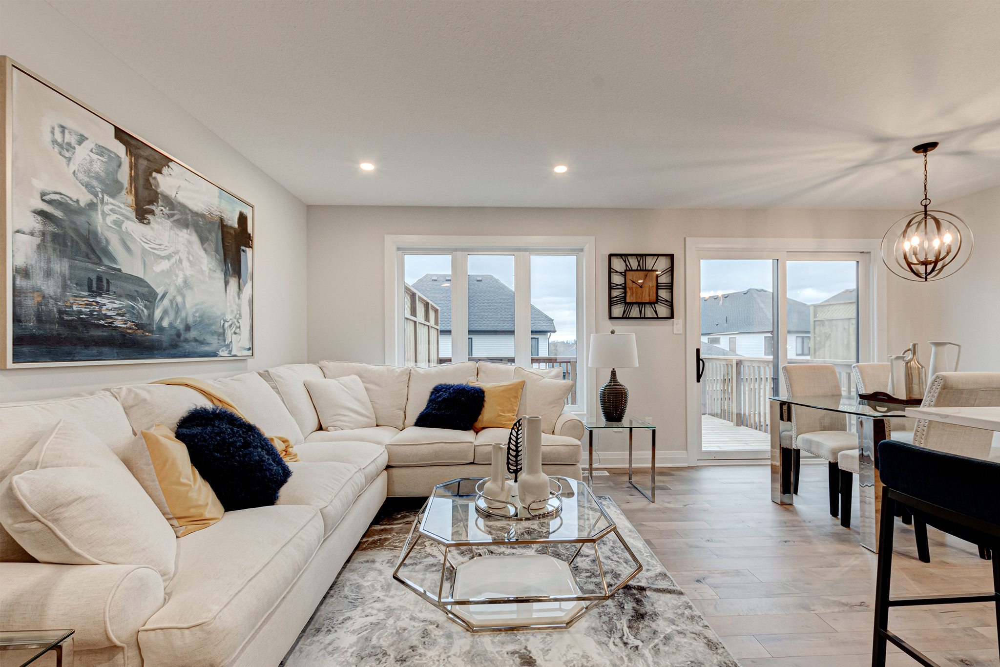 Living and dining area in a Westerdam home at Upper West by Rembrandt Homes.