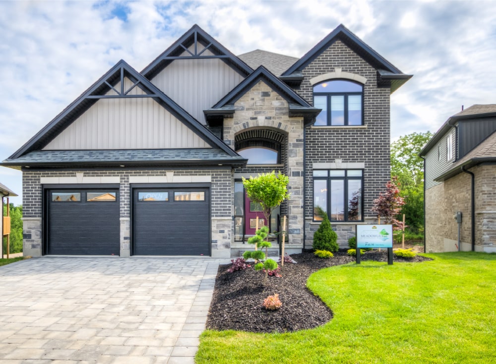 Exterior view of a single family home at Meadowlily by Rembrandt Homes