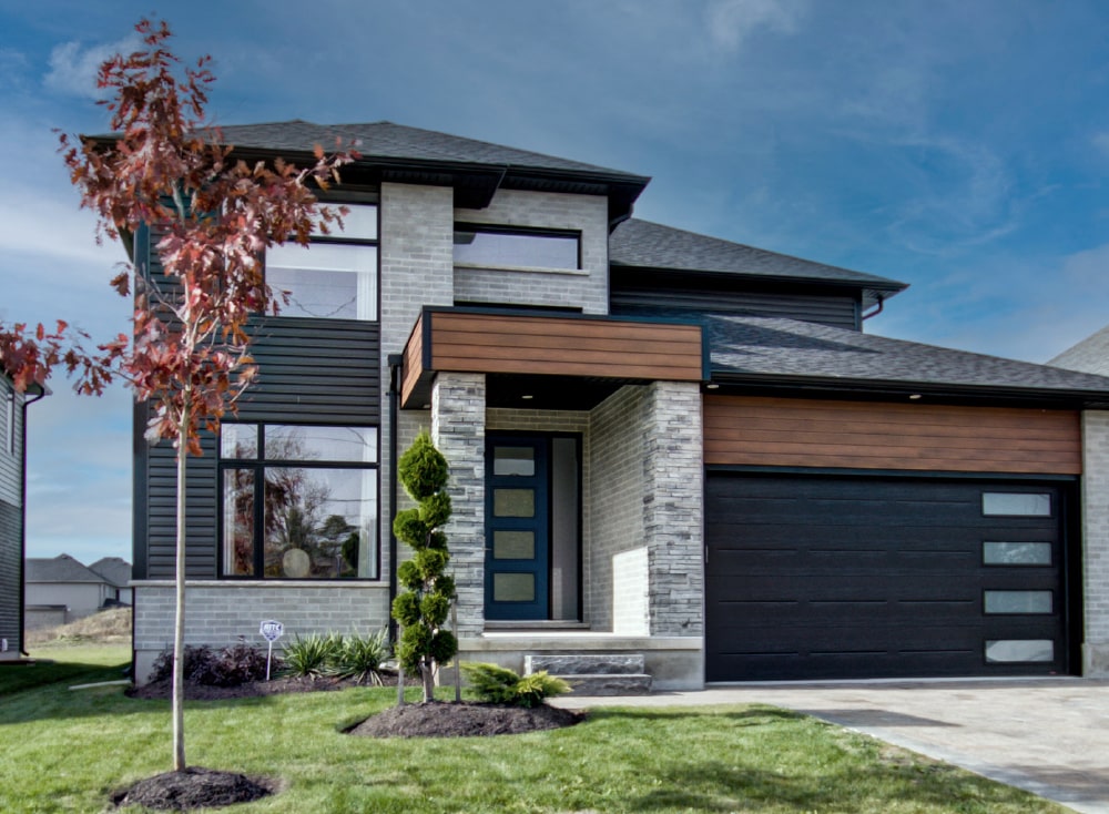 Exterior view of a home at Rembrandt Walk – a single family condo community by Rembrandt Homes