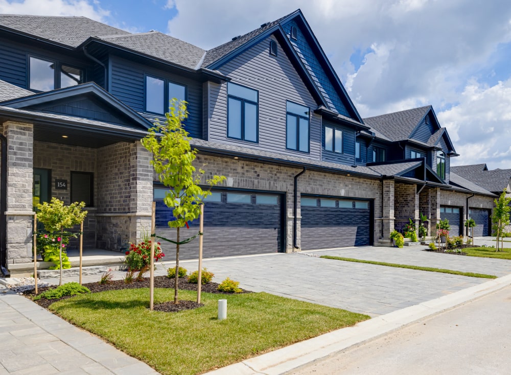 Exterior view of townhomes at Upper West by Rembrandt Homes 
