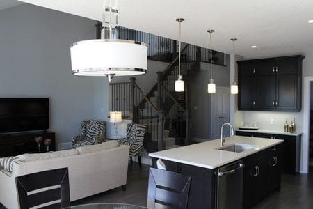 The Towns - Kitchen with island and living room area - open concept